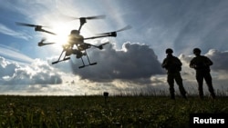 უკრაინელი სამხედროები უშვებენ უპილოტო საფრენ აპარატს (UAV) ფრონტის ხაზთან ზაპოროჟიეს რეგიონში, 2024 წლის 2 თებერვალი. საილუსტრაციო ფოტო