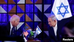 Presidenti amerikan, Joe Biden, në takim me kryeministrin izraelit, Benjamin Netanyahu, më 18 tetor të vitit të kaluar.