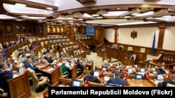 Moldova's parliament set the date on May 16.