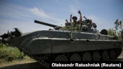 უკრაინელი სამხედროები დონეცკის ოლქში, რუსეთის საოკუპაციო ძალებისგან გათავისუფლებულ სოფელ ნესკუჩნეში. 2023 წლის 13 ივნისი 