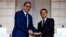 French President Emmanuel Macron (right) and Serbian President Aleksandar Vucic meet in April in Paris.
