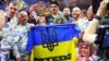 Український боксер Олександр Усик святкує перемогу над британцем Тайсоном Ф'юрі, завоювавши титул абсолютного чемпіона світу в надважкій вазі, 19 травня 2024 року 