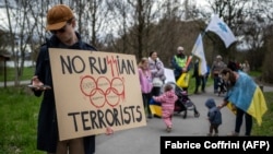 A protest in front of the headquarters of International Olympic Committee in Lausanne, Switzerland, on March 25.
