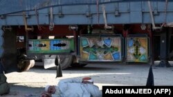 A man takes a nap under a truck near the Pakistani-Afghan border at Torkham on September 11. <br />
<br />
Hundreds of trucks and travelers were left stranded a week into the closure of the border, after a gunfight erupted across the frontier that left a Taliban guard and an Afghan civilian dead on September 6.