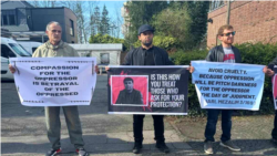 Representatives of the Tajik opposition organization Group 24 hold a protest rally in Germany. After Berlin deported a Tajik dissident back to his homeland in June, many others in the country fear they too may be forcibly returned to Tajikistan. (file photo)