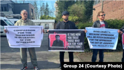 Representatives of the Tajik opposition organization Group 24 hold a protest rally in Germany. After Berlin deported a Tajik dissident back to his homeland in June, many others in the country fear they too may be forcibly returned to Tajikistan. (file photo)