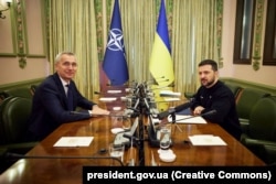 Ukraine's President Volodymyr Zelenskiy (right) and NATO Secretary-General Jens Stoltenberg met in Kyiv on April 20. Zelenskiy has accepted an invitation to attend the upcoming NATO summit in Lithuania in July.