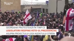 Proteste masive la Tbilisi, pe 28 mai, în timp ce parlamentul respingea veto-ul asupra proiectului de lege privind agenții străini