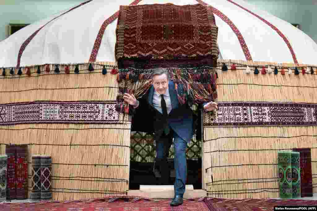British Foreign Secretary David Cameron visits the National Carpet Museum in Ashgabat, Turkmenistan.