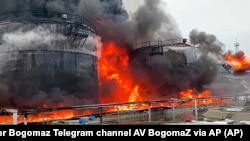 Oil tanks are seen on fire after a drone attack in Klintsy, a city in Russia’s Bryansk region, about 60 kilometers from the Russia-Ukraine border, earlier this year.