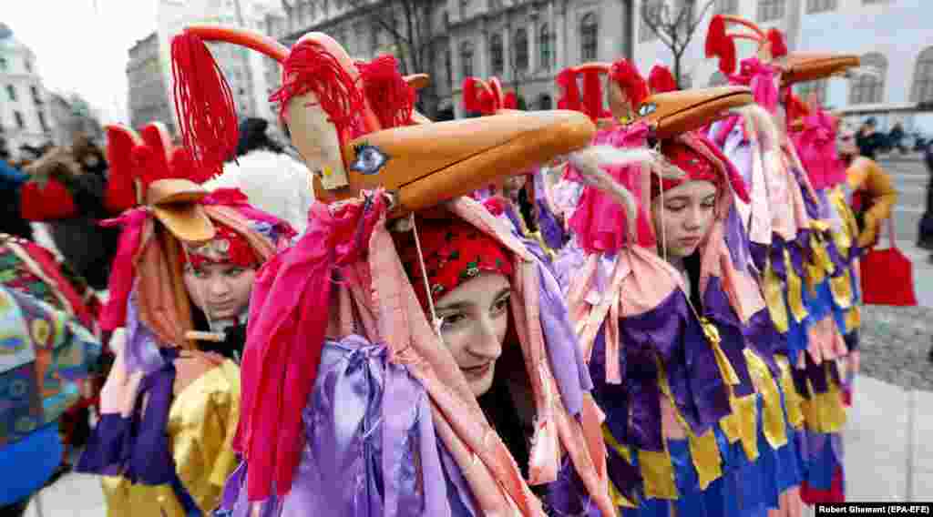 Women in stylized goat costumes during the Bucharest festival. Organizers say the event is held as &quot;a catalyst for community cohesion and a promoter of authentic Romanian cultural values.&quot;