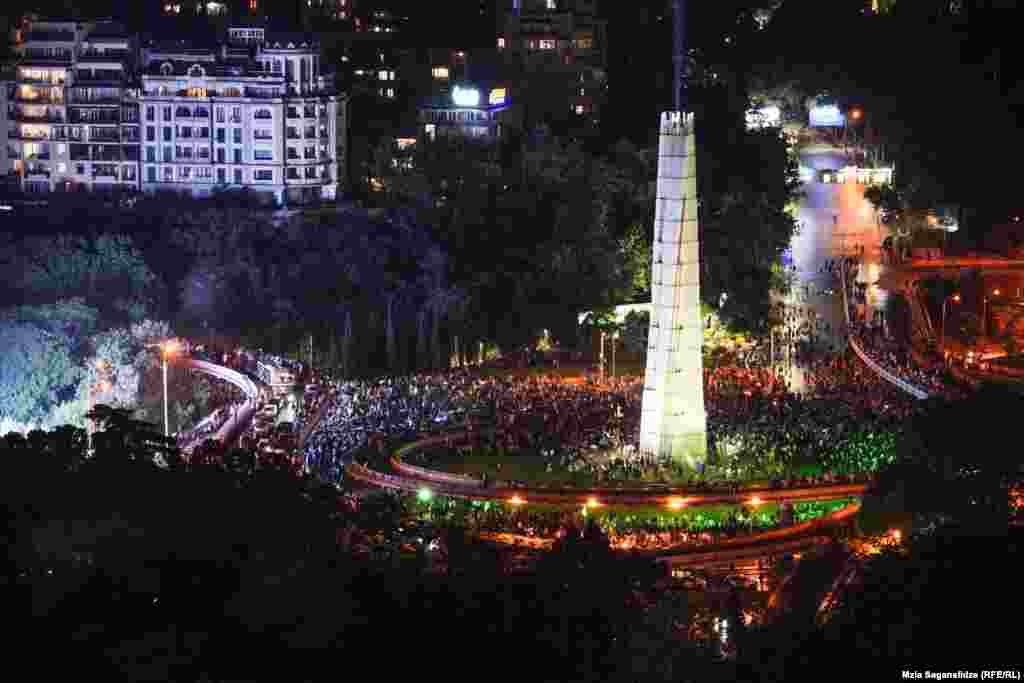 Peaceful protesters surround the monument on Heroes&#39; Square. The May 1 demonstration -- one of the largest the country has ever seen -- took place after the bill advanced in a second-reading vote.&nbsp;