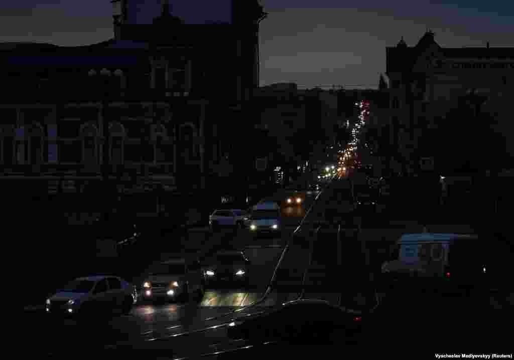 Kharkiv&#39;s city center is seen without electricity after critical infrastructure was hit by Russian missile attacks.
