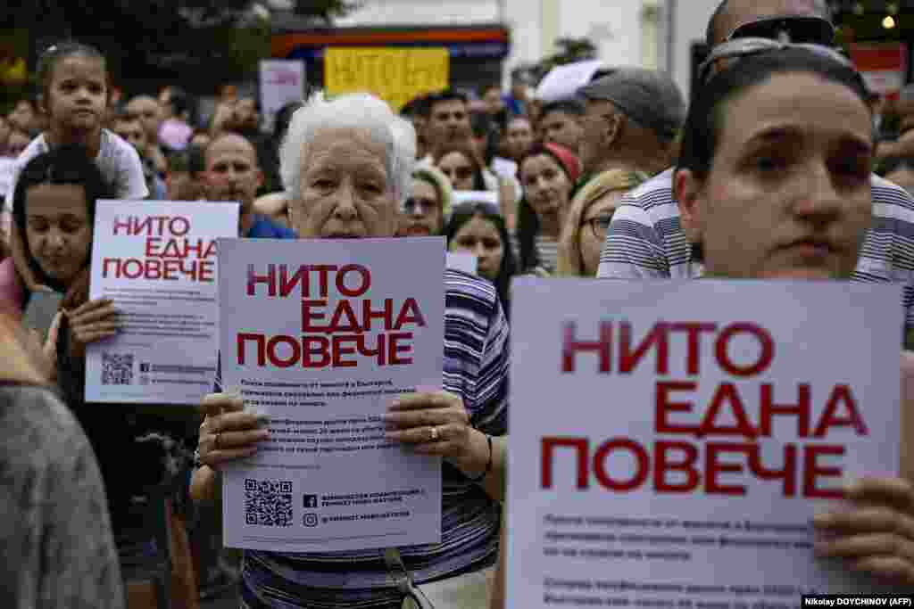 Women hold placards reading &quot;Not a single one more&quot; during a demonstration against domestic violence in Sofia on July 31. The rally followed a case of shocking violence against an 18-year-old woman.