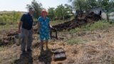 Moldova, Family from Opaci, Causeni, making dry dung fuel
