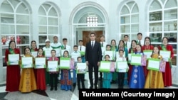 Turkmen President Serdar Berdymukhammedov visits an Asghabat orphanage in May 2022. (Official website)