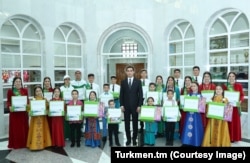 An official photo shows Turkmenistan's president visiting an orphanage in Asghabat in 2022.