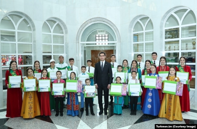 An official photo shows Turkmenistan's president visiting an orphanage in Asghabat in 2022.