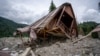 A cottage lies in ruin after a devastating landslide struck the resort town of Shovi on August 3, 2023.