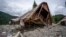 A cottage lies in ruin after a devastating landslide struck the resort town of Shovi on August 3, 2023.
