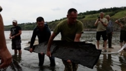 Receding Ukrainian River Reveals Archaeological Secrets