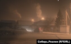 Smog from burning coal blankets the city of Abakan in December 2023.