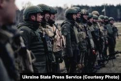 Troops of the Bureviy Brigade train offensive operations during exercises in the Kyiv region.