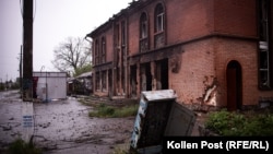 A bombed-out building in the center of Kozacha Lopan, near the Russian border in Ukraine's Kharkiv region. 