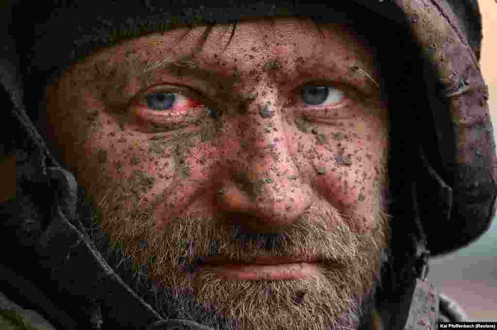 The muddied face of a Ukrainian soldier who returned from combat close to Bakhmut on April 15. Kyiv&#39;s fighters are still holding the beleaguered eastern city of Bakhmut despite intensely brutal combat between Ukrainian and Russian military forces.