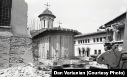 A church awaits its fate at the hands of a bulldozer.