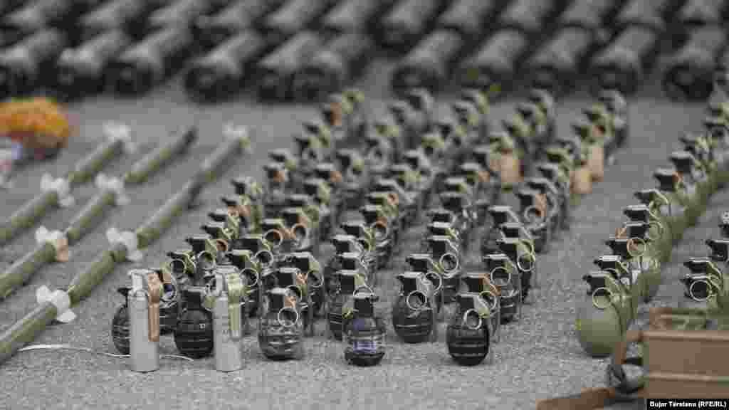 Hand grenades confiscated from the northern, Serb-majority district where an attack on an Orthodox monastery left four people dead, including a police officer, were exhibited to journalists by Kosovar police on September 25. &nbsp;