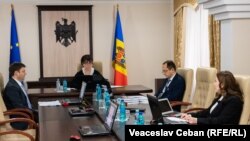 Consiliului Superior al Magistraturii din care fac parte trei reprezentanți ai societății civile, Ion Guzun, Alexandru Postică și Tatiana Ciaglic și judecătoarea Nina Cernat, care a preluat temporar conducerea CSM.