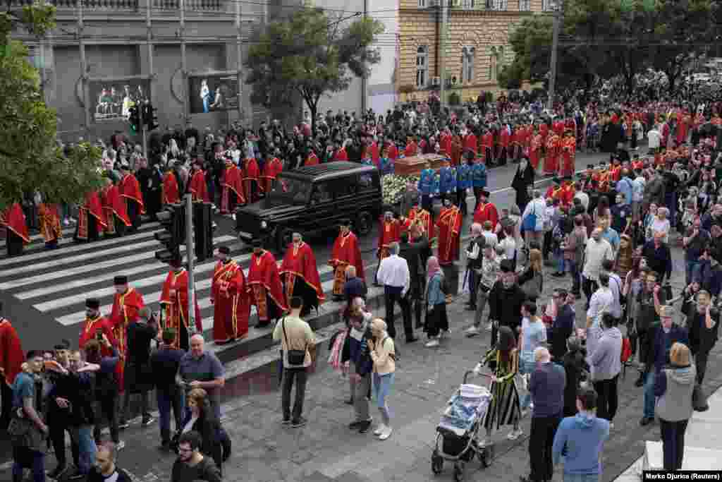 Members of the Serbian military, along with Orthodox priests, escorted a coffin containing the remains of Serbian Orthodox Bishop Nikolai, who was canonized as St. Nikolai in 2003, as the procession traveled toward the Church of St. Sava. &nbsp;