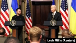 Ukrainian President Volodymyr Zelenskiy (left) and U.S. President Joe Biden hold a press conference at the White House in Washington in December 2023.