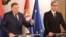 Bosnian Serb leader Milorad Dodik and Serbian President Aleksandar Vucic attend a press conference in Belgrade on April 14.