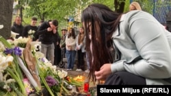 Mourners gather outside the school in Belgrade on May 4.