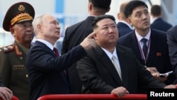 Президент Росії Володимир Путін і лідер Північної Кореї Кім Чен Ин під час візиту на російський космодром в Амурській області РФ, 13 вересня 2023 року