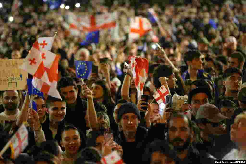 Thousands of Georgians rally late into the night on April 17-18 in front of parliament, demanding that the government immediately withdraw a controversial &quot;foreign agents&quot; bill.