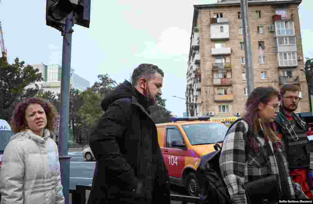 An injured man is seen at the site of the strike. At least&nbsp;16 people were wounded, including an 11-month-old baby.