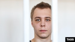 Nikita Zhuravel in court on October 13 with what appears to be bruising on his face. 