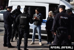 A demonstration in support of Aleksei Navalny in St. Petersburg is stopped by police on June 4.