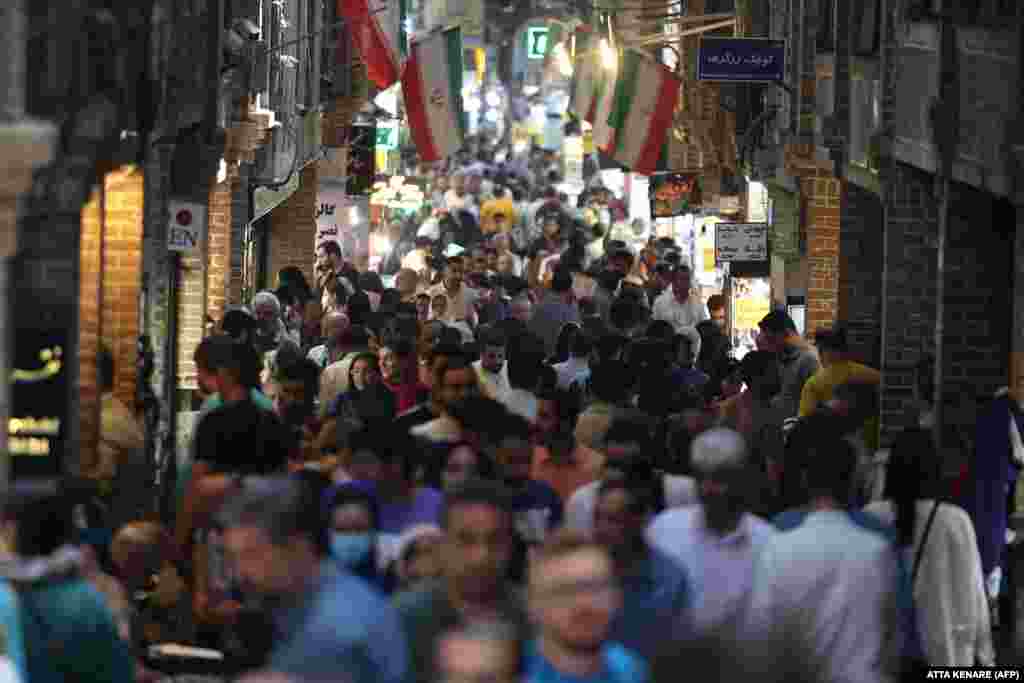 Iranians shop at the Grand Bazaar in Tehran.