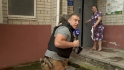 Reporter Runs For Cover Amid Shelling Of Ukrainian Flood Evacuations