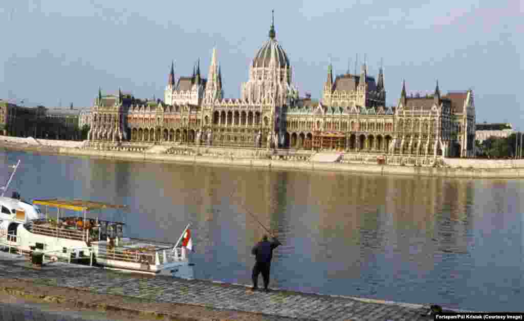 The Hungarian parliament is shown in 1970. The red star of the legislature building remained in place until 1990, when it was finally removed following the collapse of communist rule in Hungary. Today, the weather-worn star can be seen inside the parliament&rsquo;s museum. &nbsp;