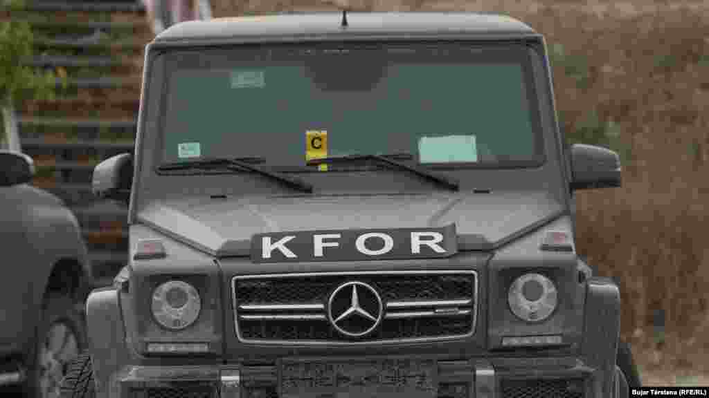 This vehicle, which is suspected to have been used by the attackers, had a sticker with the inscription KFOR, the NATO-led peacekeeping force in Kosovo.