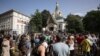 A crowd gathers ton protest outside a Russian Orthodox church in Sofia on September 24. 