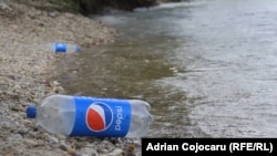 Plastic bottle floating on Danube river