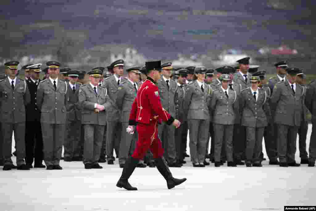 Military officers attend the inauguration. Initially aligned with the Soviet bloc during the Cold War, Albania embraced the West after the fall of the communist regime in 1990 and has been a NATO member since 2009.