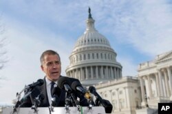 Hunter Biden, fiul președintelui american, într-o conferință de presă în fața Capitoliului de la Washington, 12 decembrie.