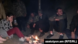 Armenia - Protesting residents of Tavush province sit around a bonfire, April 23, 2024.